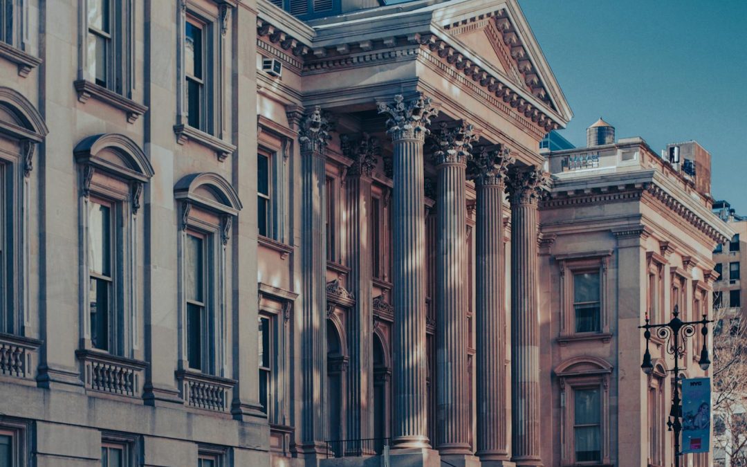 Neoclassical architecture of Tweed Courthouse in Manhattan at dusk capturing urban elegance.